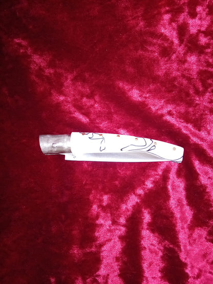 Coltello pattadese con anima ,lama 11 CM ,impugnatura  in kirinite bianca e nera