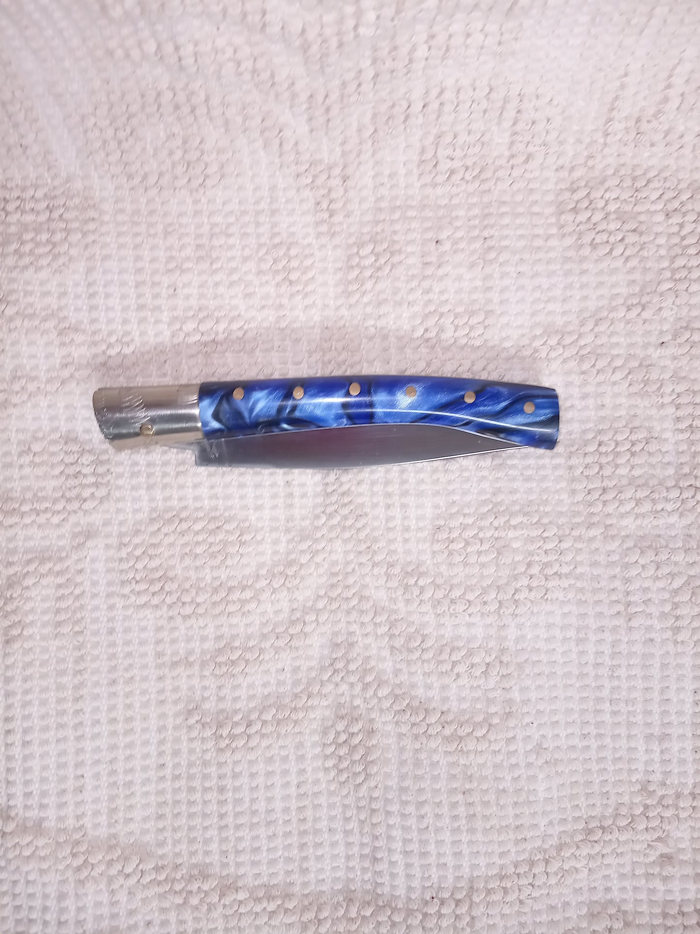 Coltello pattadese con anima ,lama 10CM ,impugnatura  in kirinite blu e nera