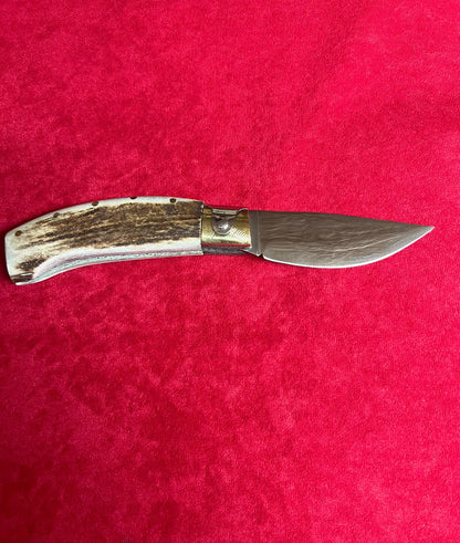 Coltello arburesa con anima , lama 9,5 CM impugnatura in corno di cervo.
