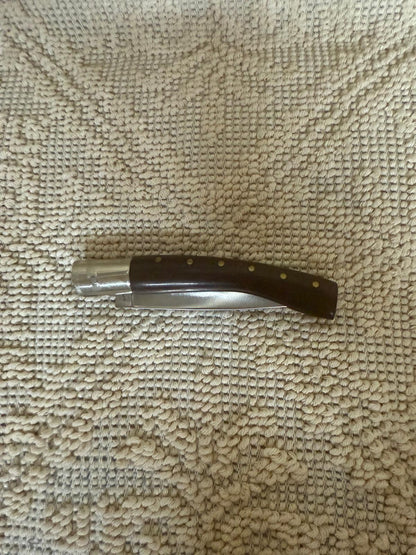 Coltello pattadese con anima, lama  11 CM ,impugnatura in legno di ebano scuro.