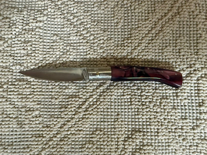 Coltello  pattadese con anima lama 9,2 CM  impugnatura in kirinite fucsia e nero.
