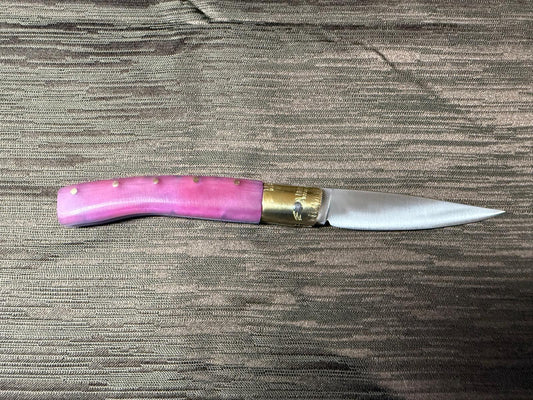 Coltello  pattadese con anima , lama 9,5 CM  impugnatura in resina rosa, con sfumature turchese.