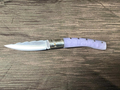 Coltello  pattadese con anima decorata , lama 9,5 CM  impugnatura in resina lilla.