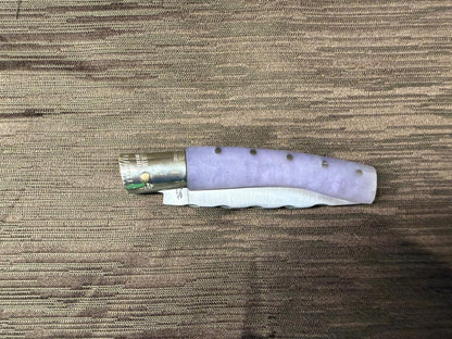 Coltello  pattadese con anima decorata , lama 9,5 CM  impugnatura in resina lilla.