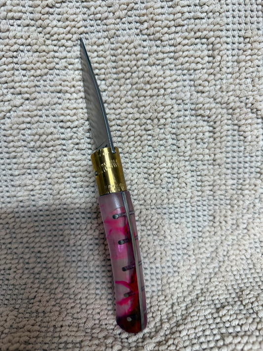 Coltello  pattadese con anima , lama classica 8,5 CM  impugnatura in resina trasparente con sfumature di vari colori.